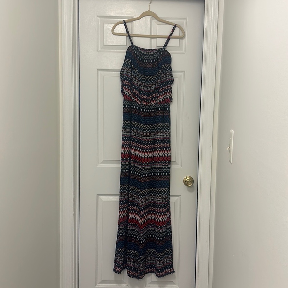 Wide legged pattern 100% polyester jumpsuit: Never worn